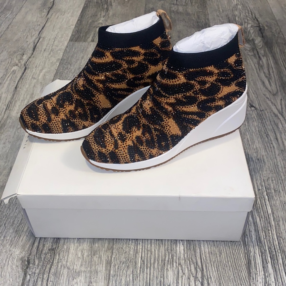 Alex Marie formal cheetah print sneakers.